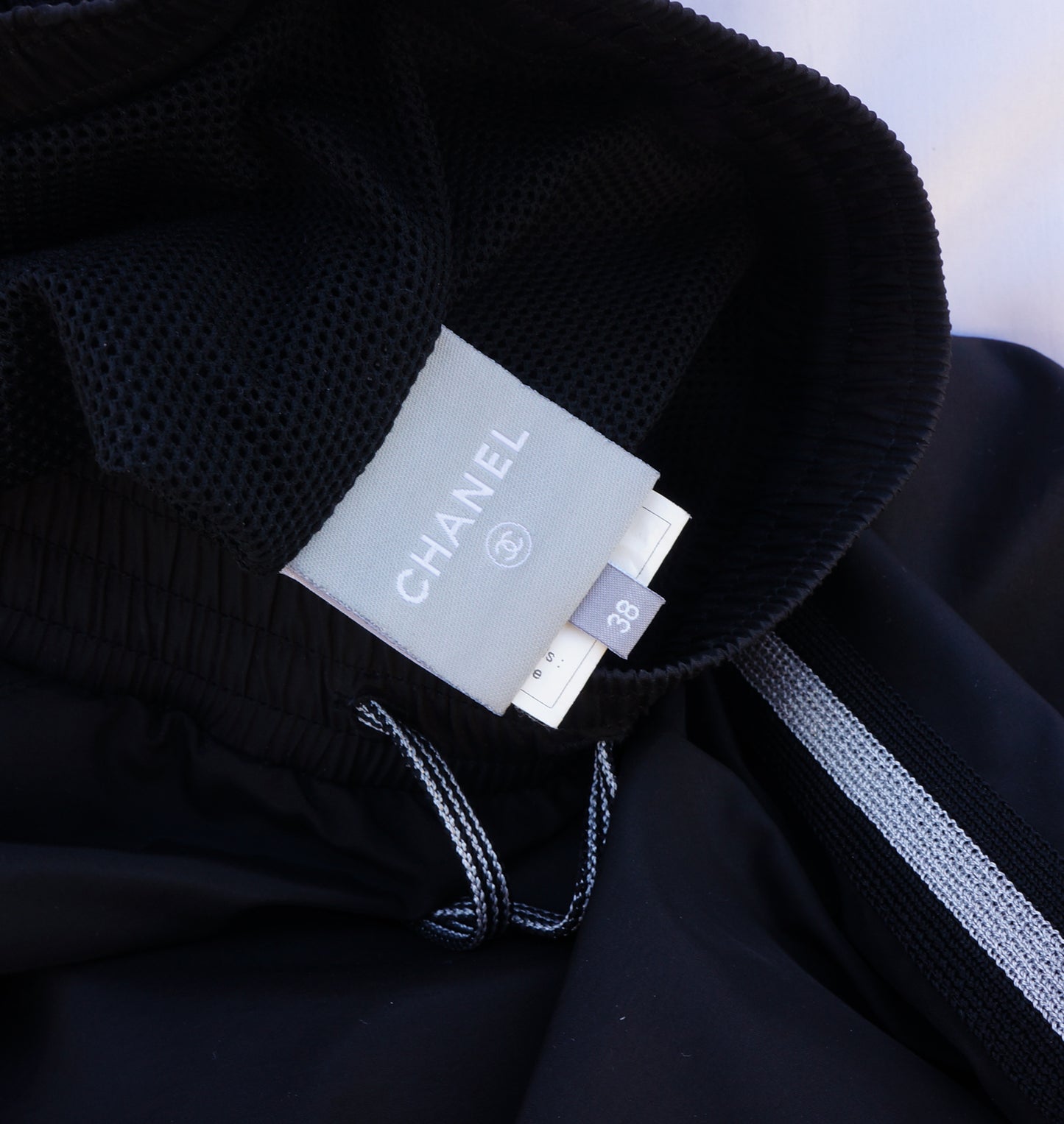 CHANEL SPORT MID-RISE TRACK PANTS - leefluxury.com